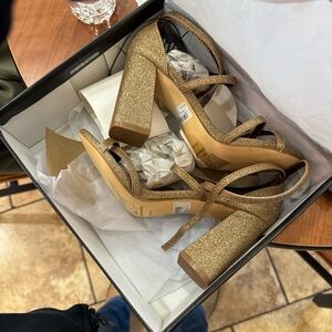 Women’s gold high heels
